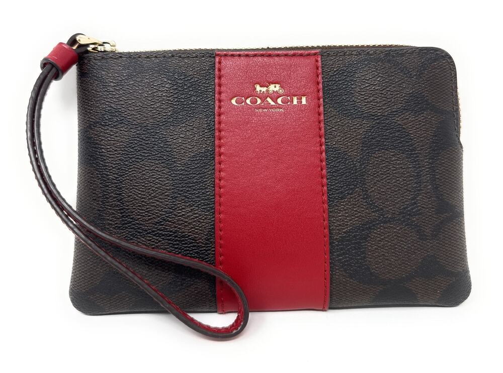 Coach Corner Zip Wristlet In Signature Canvas Brown Red